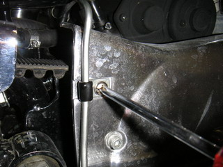 Removing the rear brake line clip
